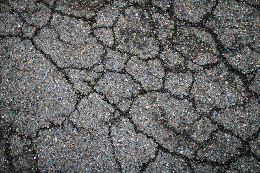 Web of cracks across an aging flatwork surface